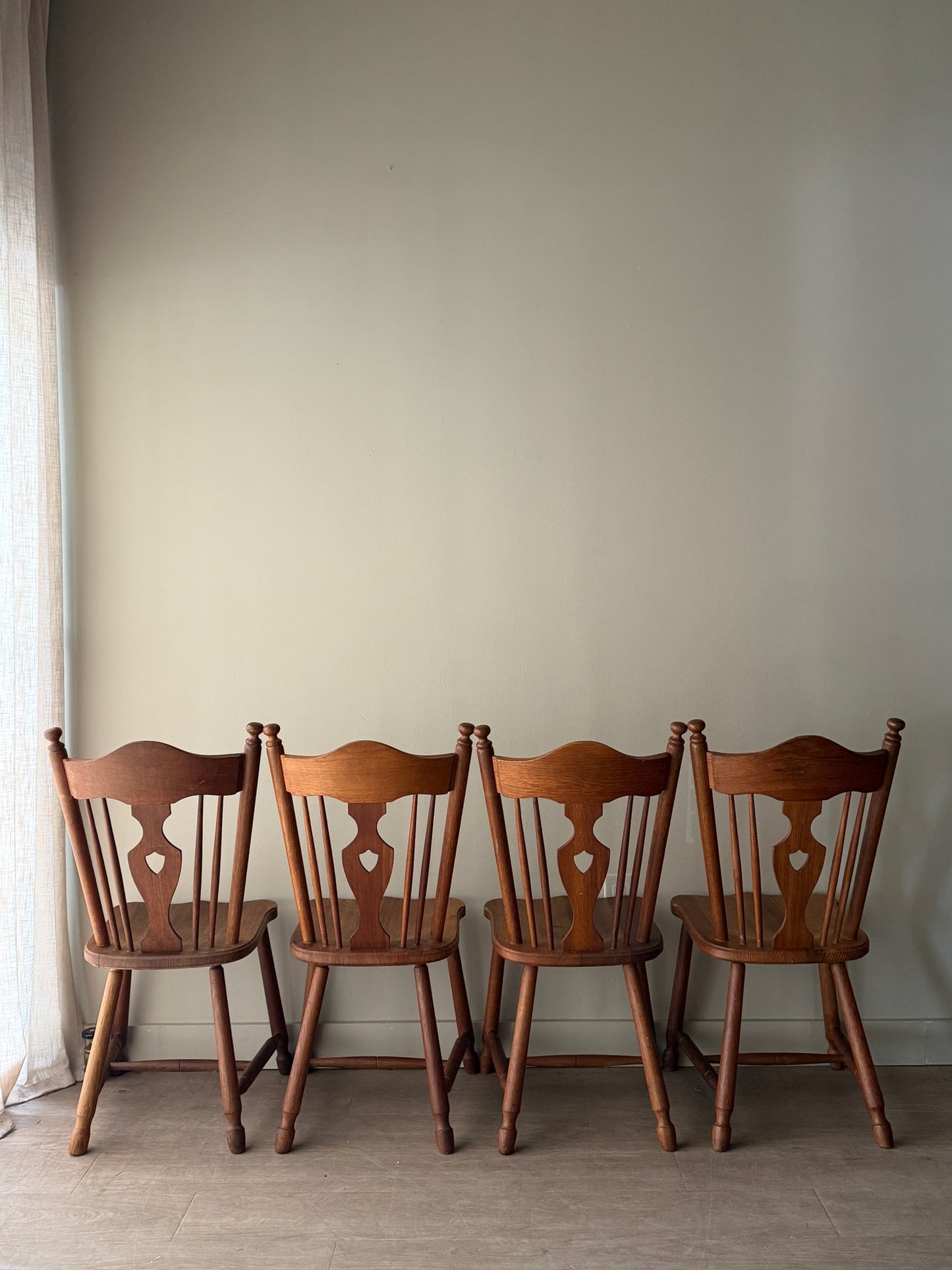 Scandinavian oak dining chairs. Sold as a set of 4.