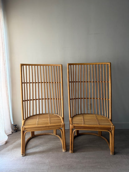 Rattan chairs. Sold individually.