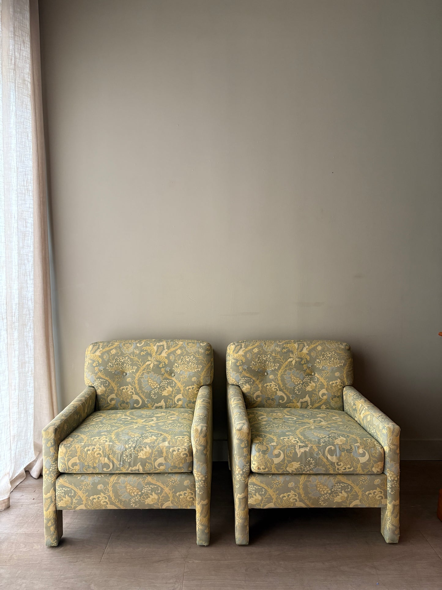 Directional green floral upholstered lounge chairs. Sold individually.