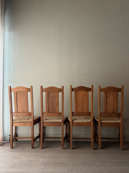 Dutch oak rush seat dining chairs. Sold in pairs.