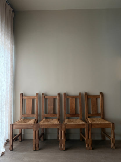 Belgian De Puydt oak & rush dining chairs. Sold in pairs.