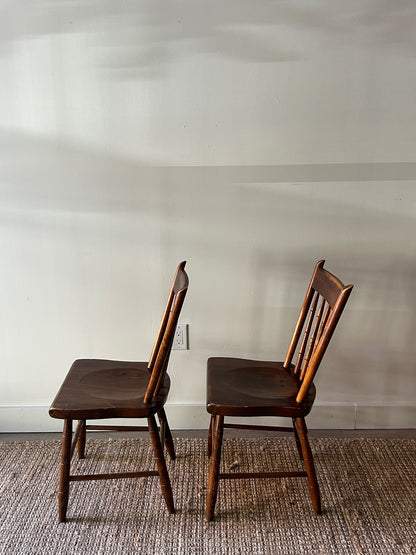 Pair of carved plank seat chairs