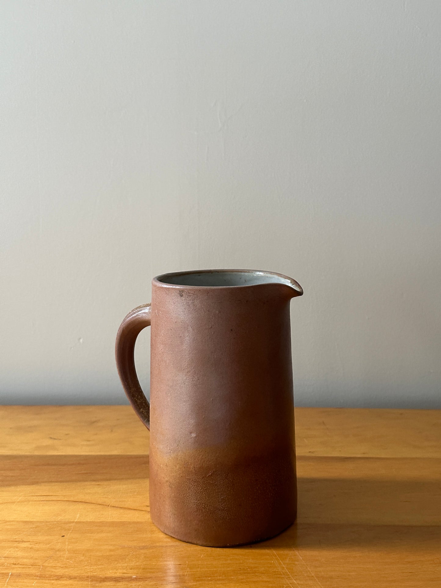 Brown stoneware pitcher