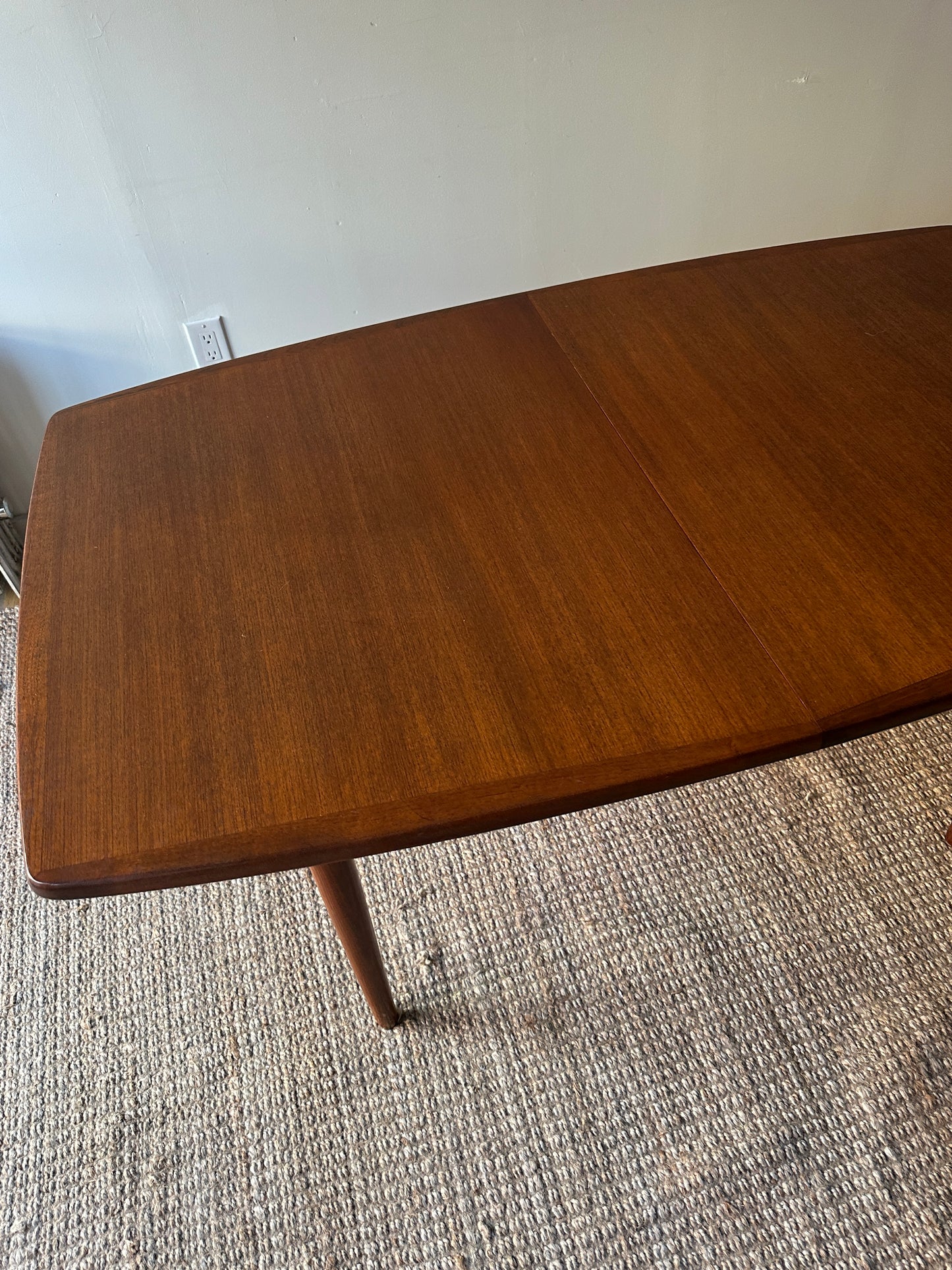 Danish teak dining table with two leaves