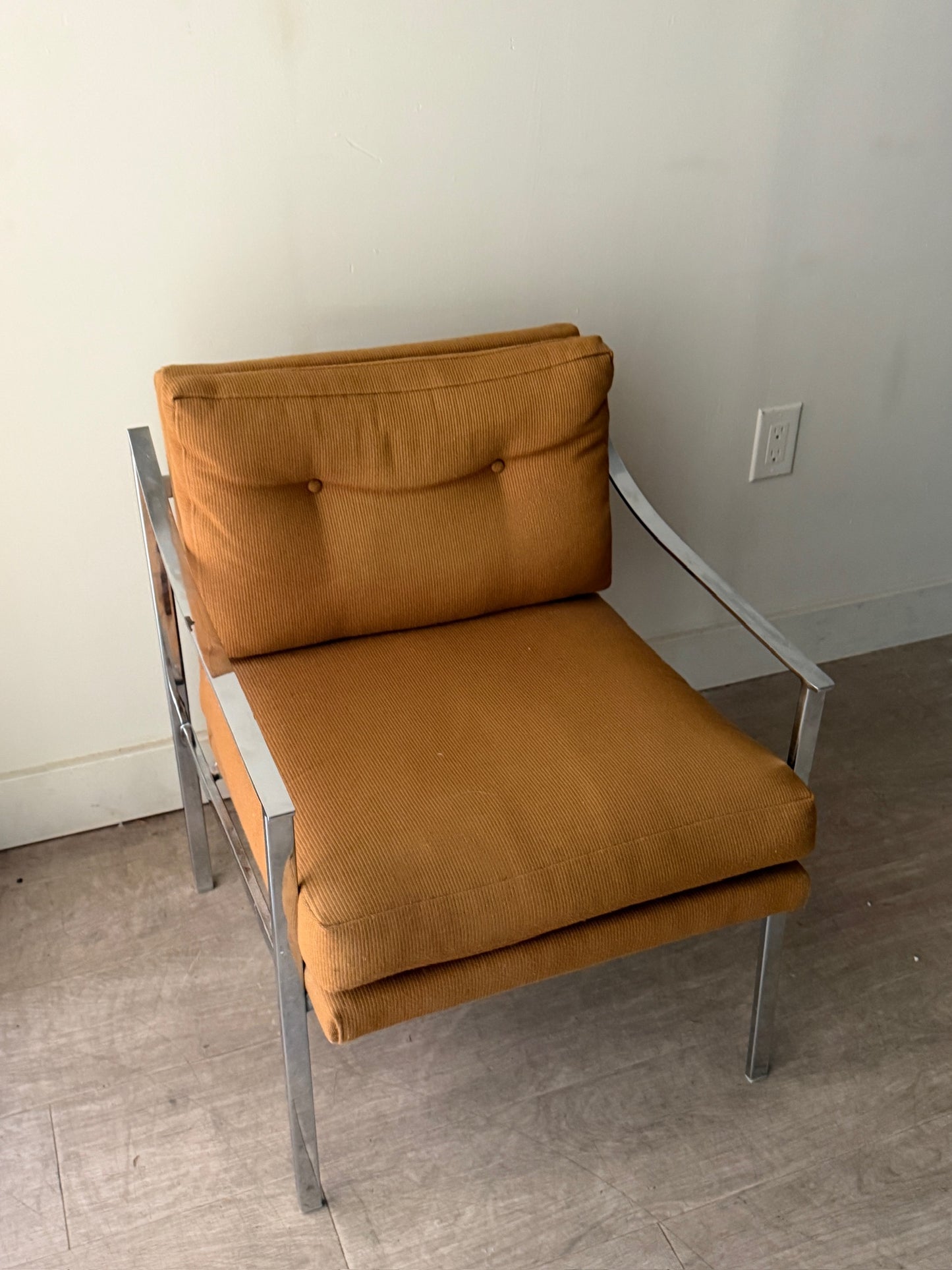 Ochre upholstered chrome armchair