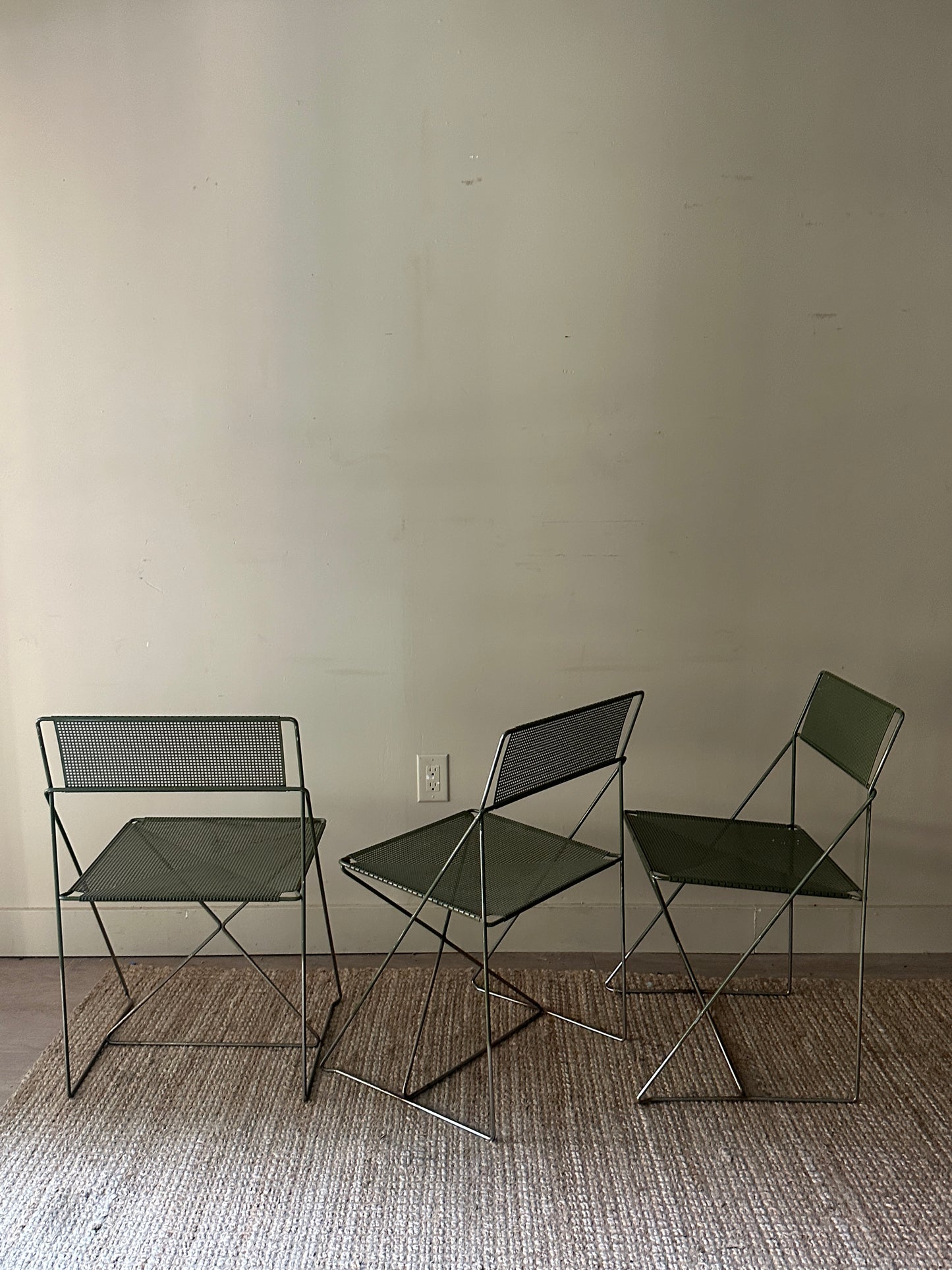 Niels Jorgen Haugesen metal chairs. Sold individually.