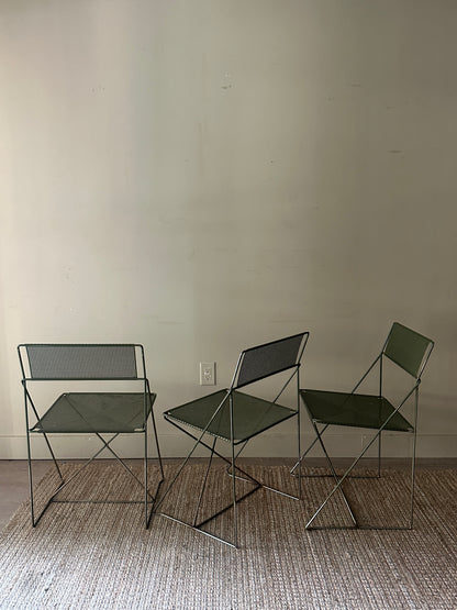Niels Jorgen Haugesen metal chairs. Sold individually.
