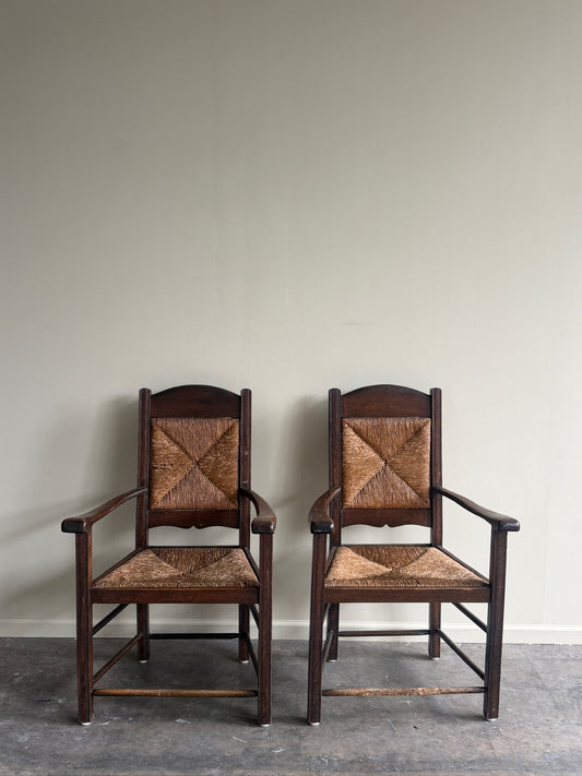 English provincial oak & rush armchairs. Sold individually.