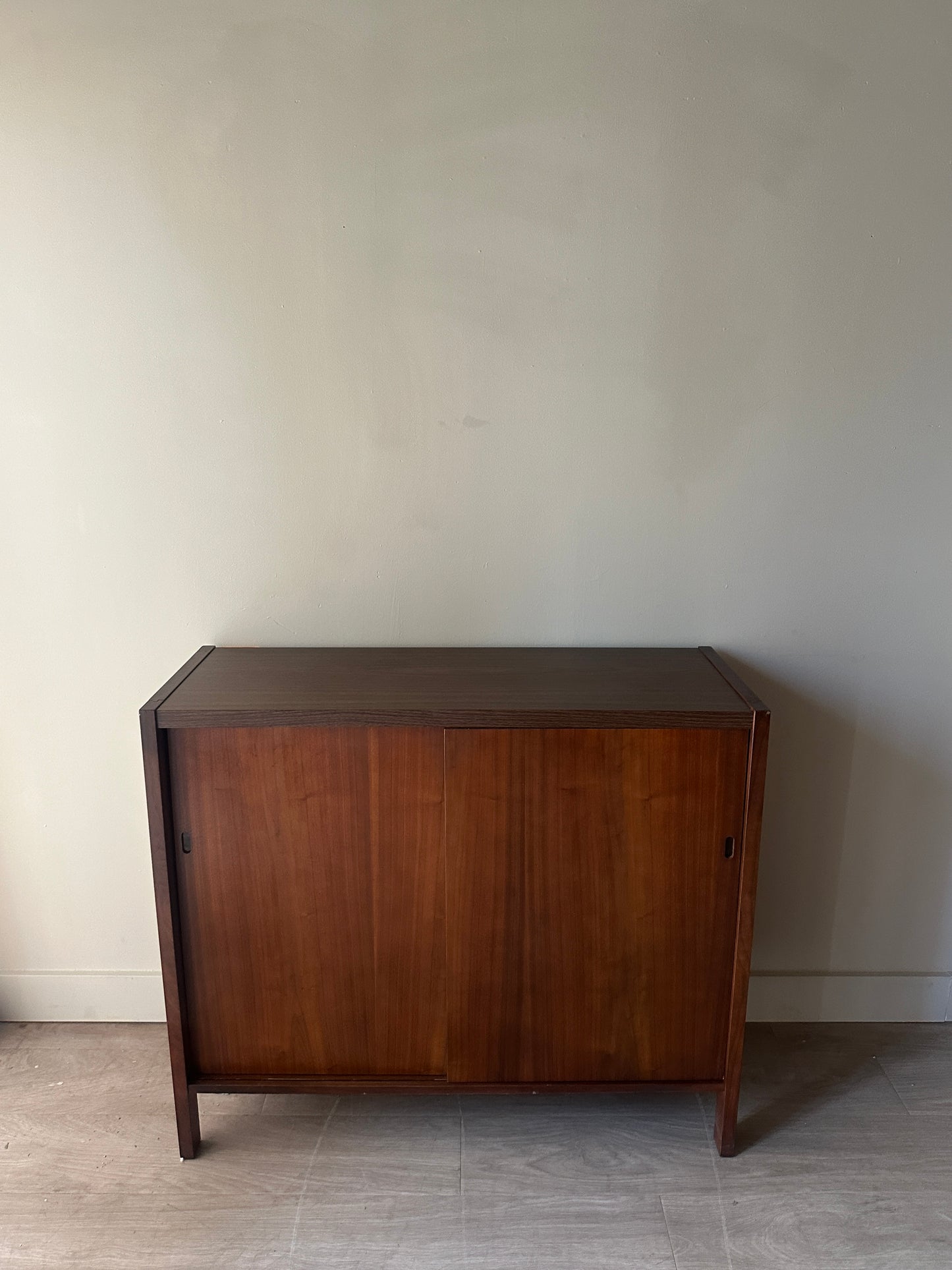 Walnut sliding door cabinet