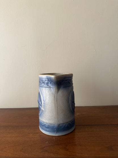 Salt glazed stoneware pitcher with birds