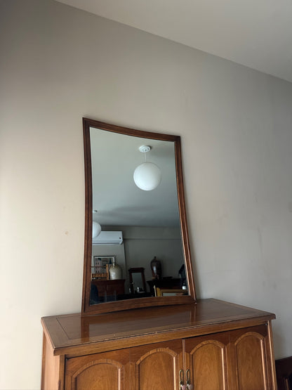 Serpentine walnut mirror