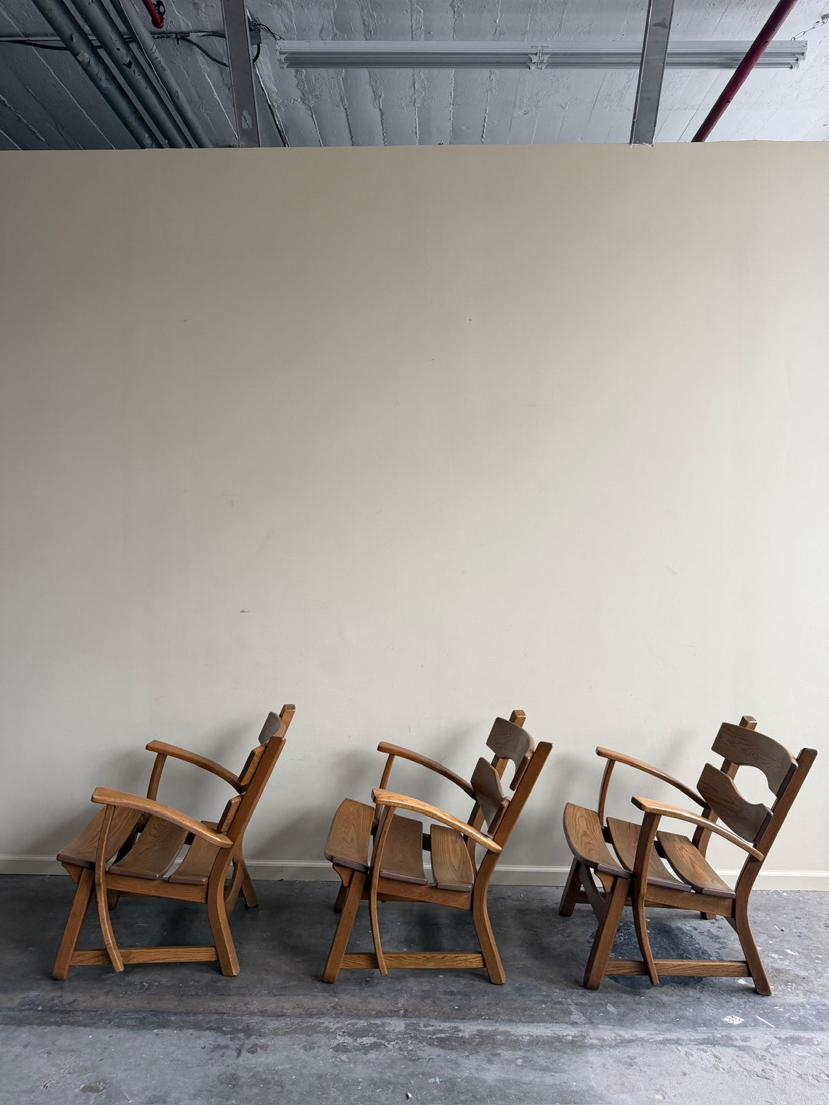 AWA Almelo Dutch oak armchairs. Sold individually.