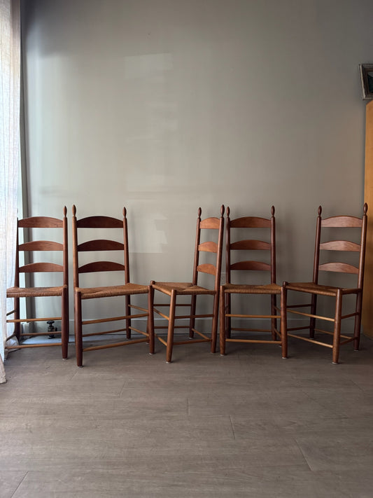 Cherry ladder back rush seat chairs. Sold individually.