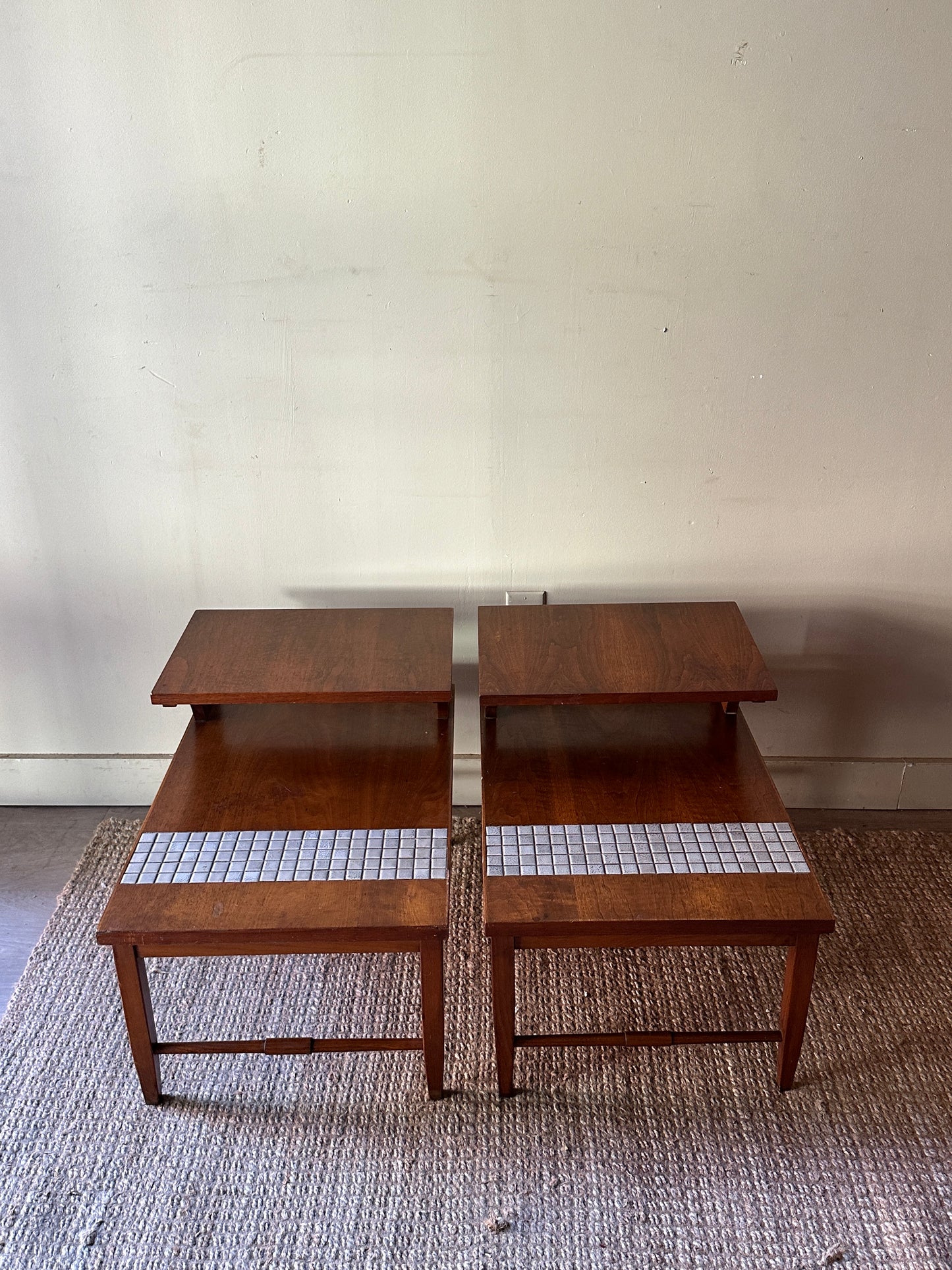 Pair of walnut and tile side tables. Sold individually
