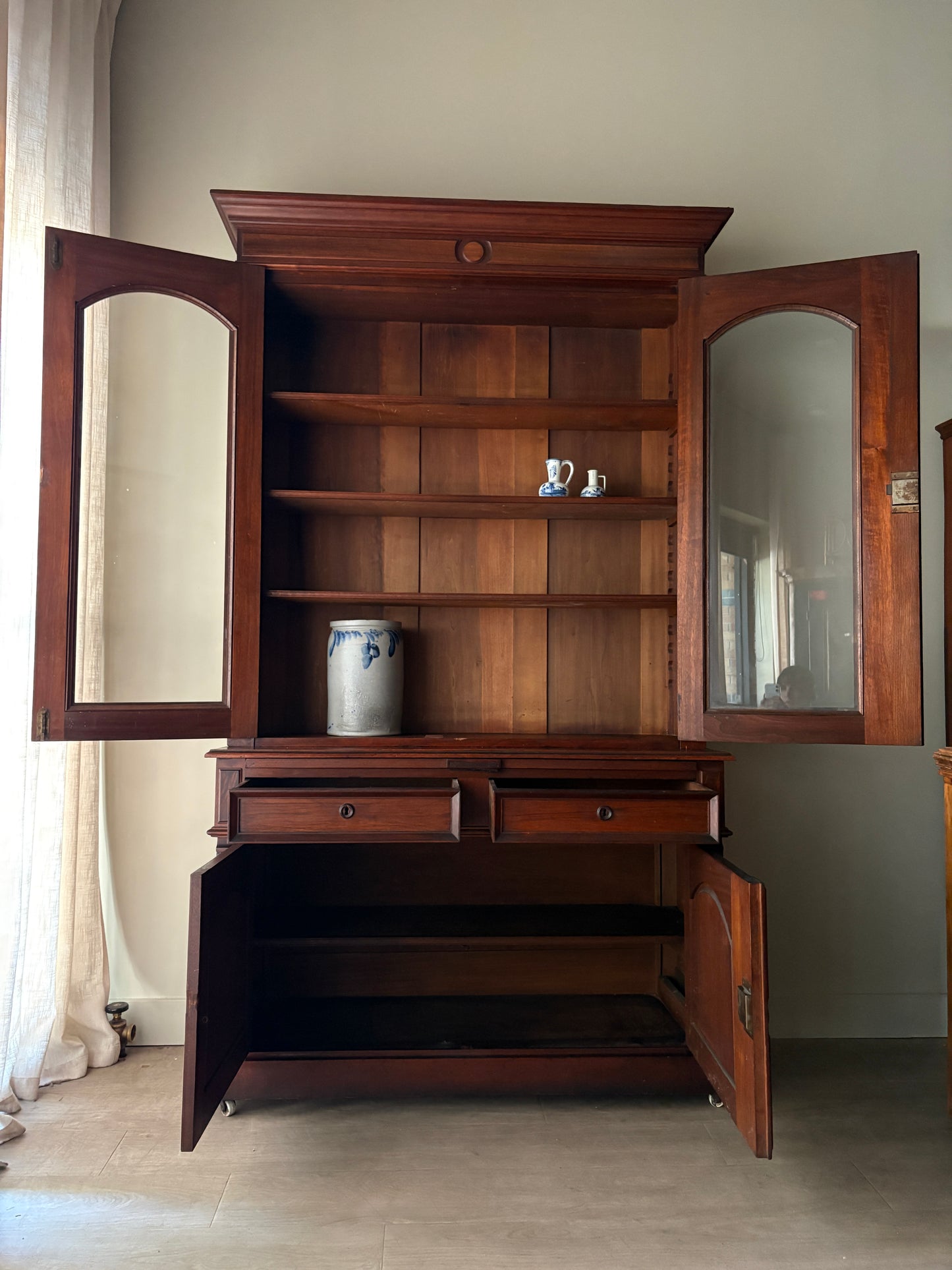 Victorian walnut two piece display hutch with writing slide
