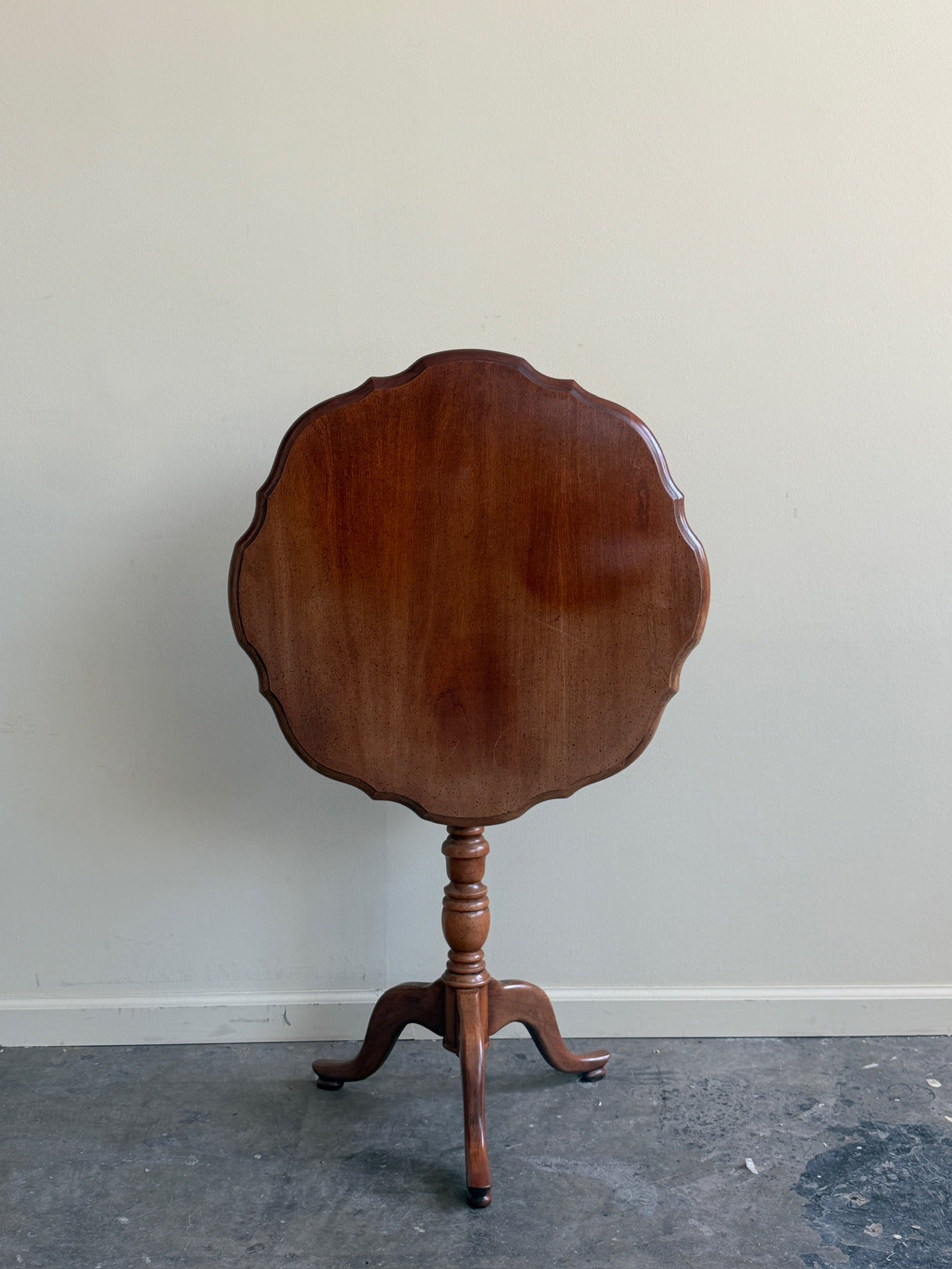 Walnut tilt-top side table