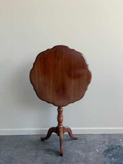 Walnut tilt-top side table