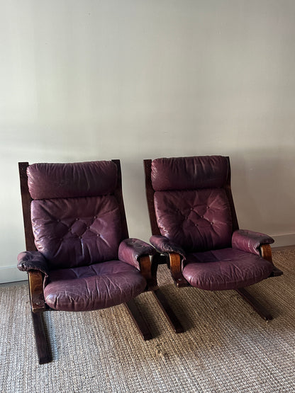 Danish bentwood leather lounge chairs. Sold individually.