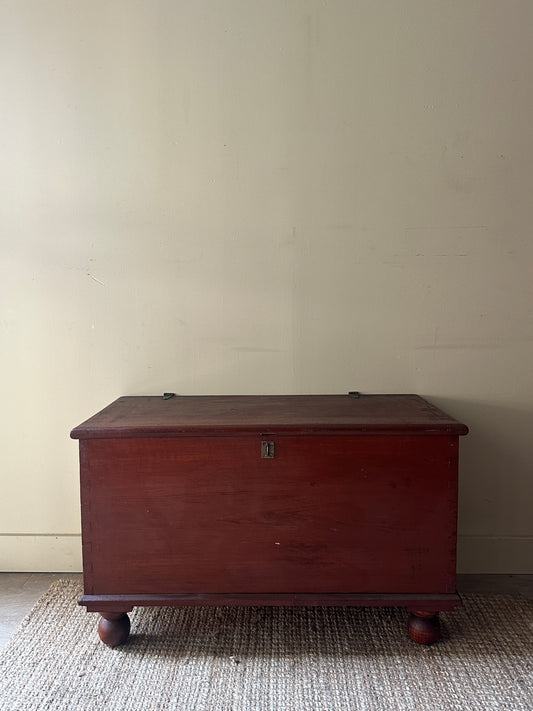 Red ball foot chest