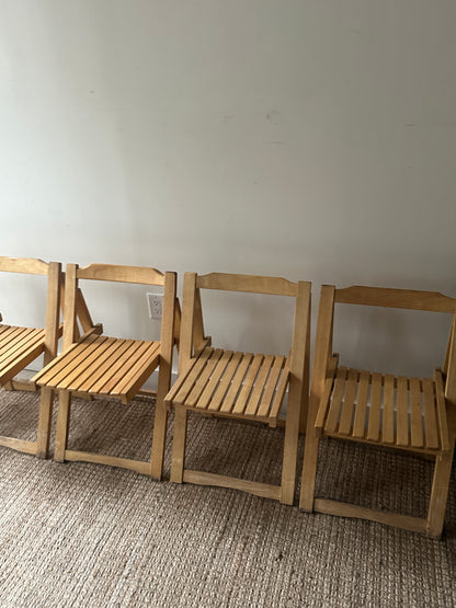 5 folding dining chairs. Sold individually.