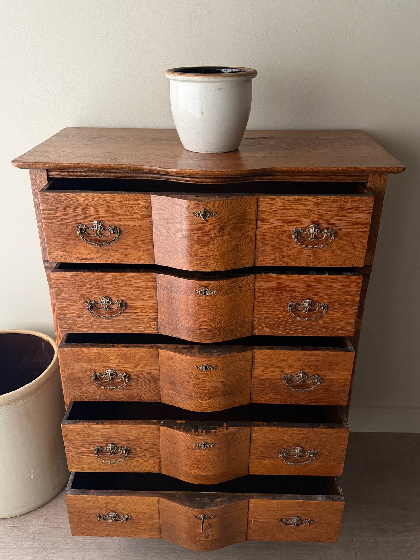 Oak serpentine tallboy dresser