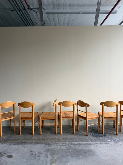 Rainer Daumillier pine dining chairs. Sold individually.