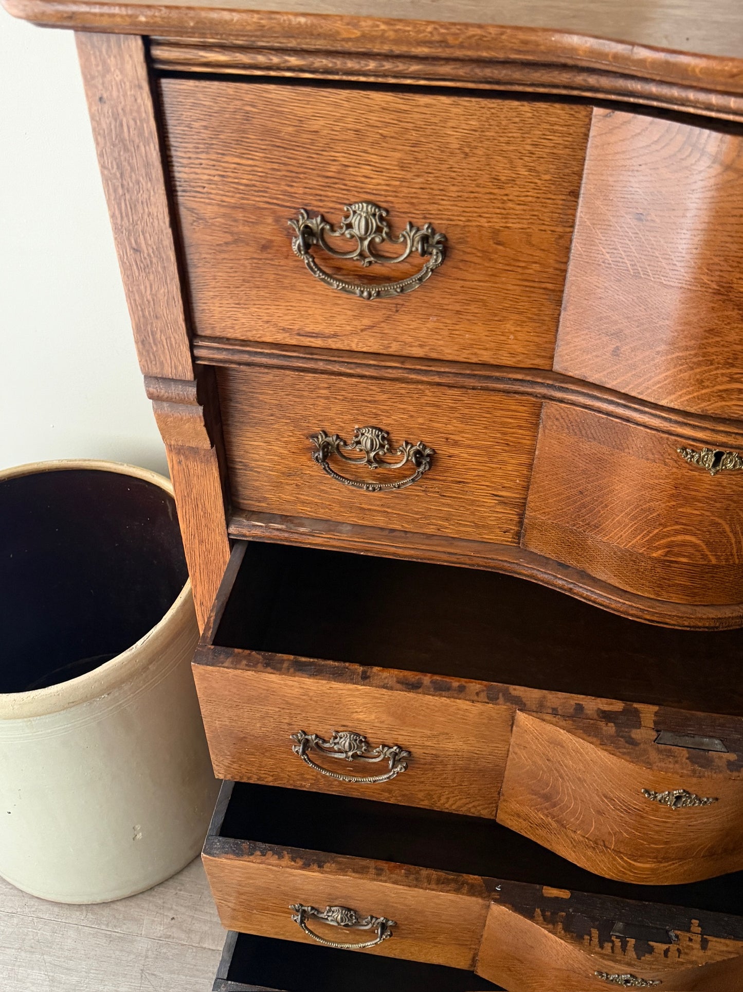 Oak serpentine tallboy dresser