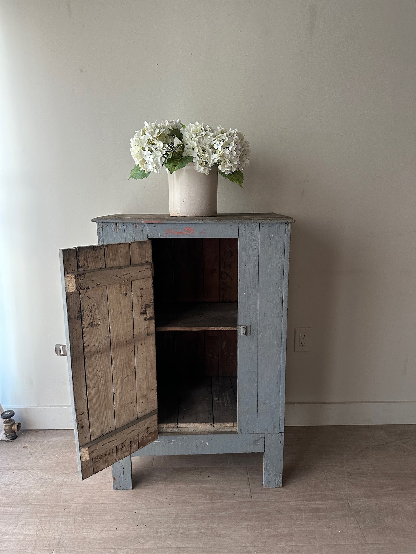 Blue painted cupboard