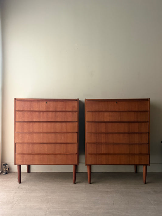 Danish teak tallboy dresser (left)
