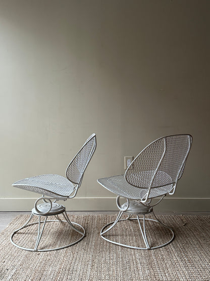 Homecrest metal clam shell swivel chairs. Sold as a set.