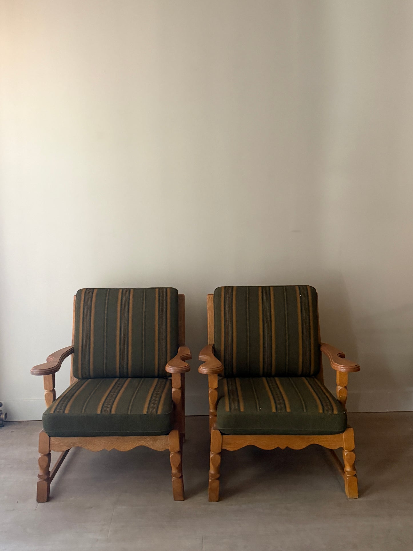 Henning Kjaernulf Danish oak lounge chairs. Sold individually.