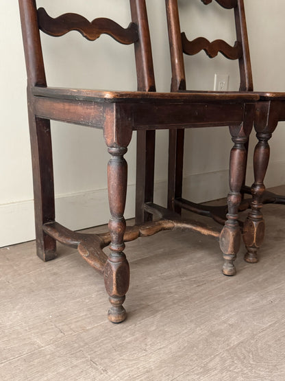 French oak ladder back dining chairs. Sold as a pair.