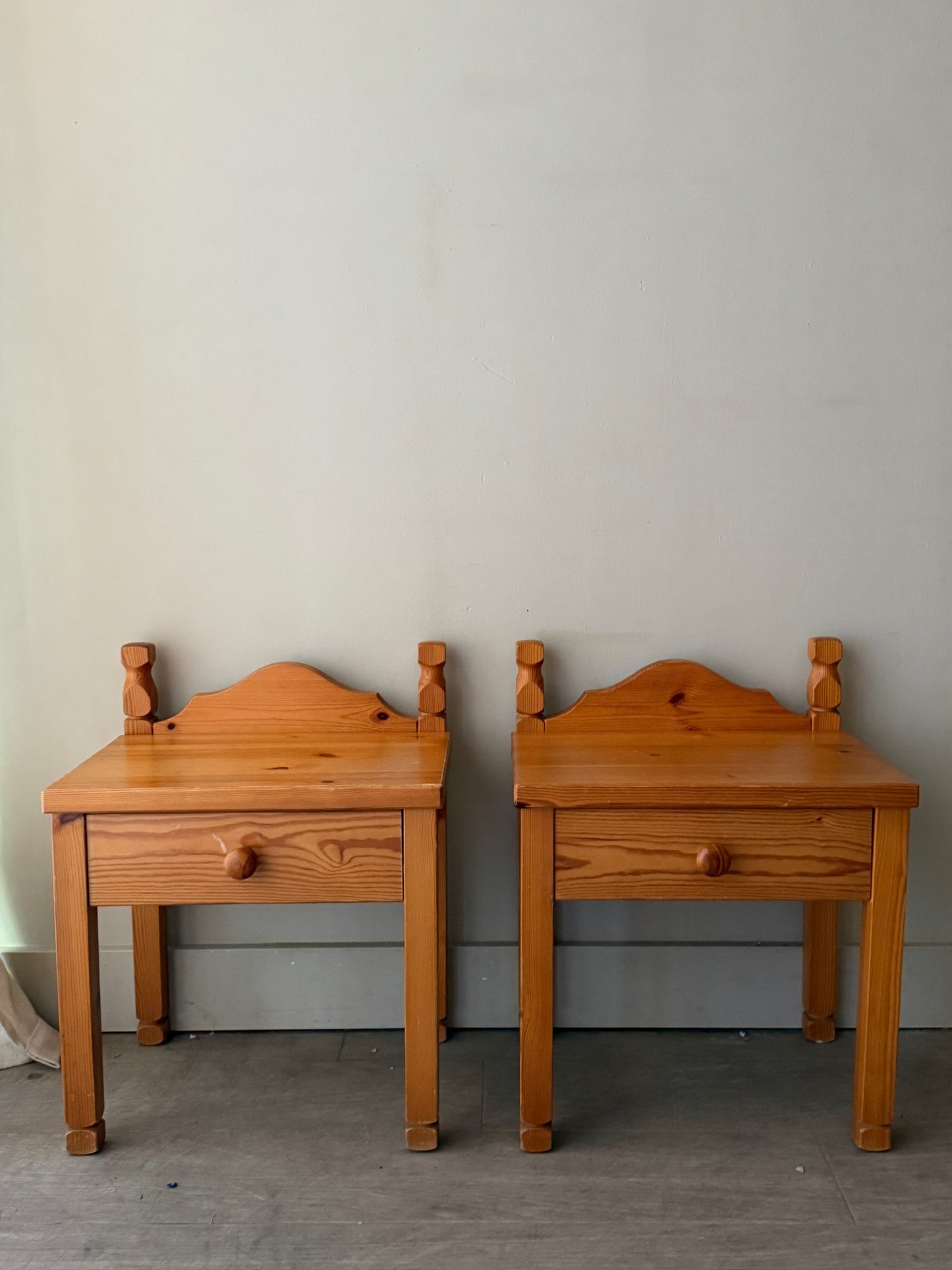 Scandinavian pine nightstands. Sold as a pair.