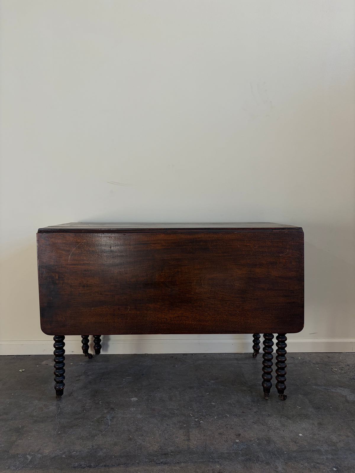 Pennsylvania Sheraton Walnut Six-Leg Drop Leaf Table