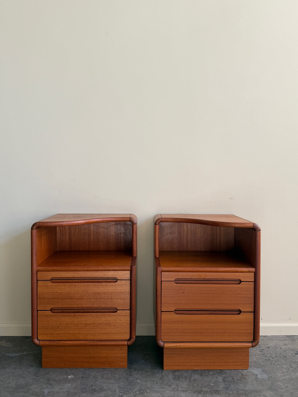 Sun Cabinet Co. teak nightstands. Sold as a pair.