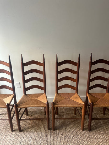 Ladder back rush seat chairs. Sold individually.