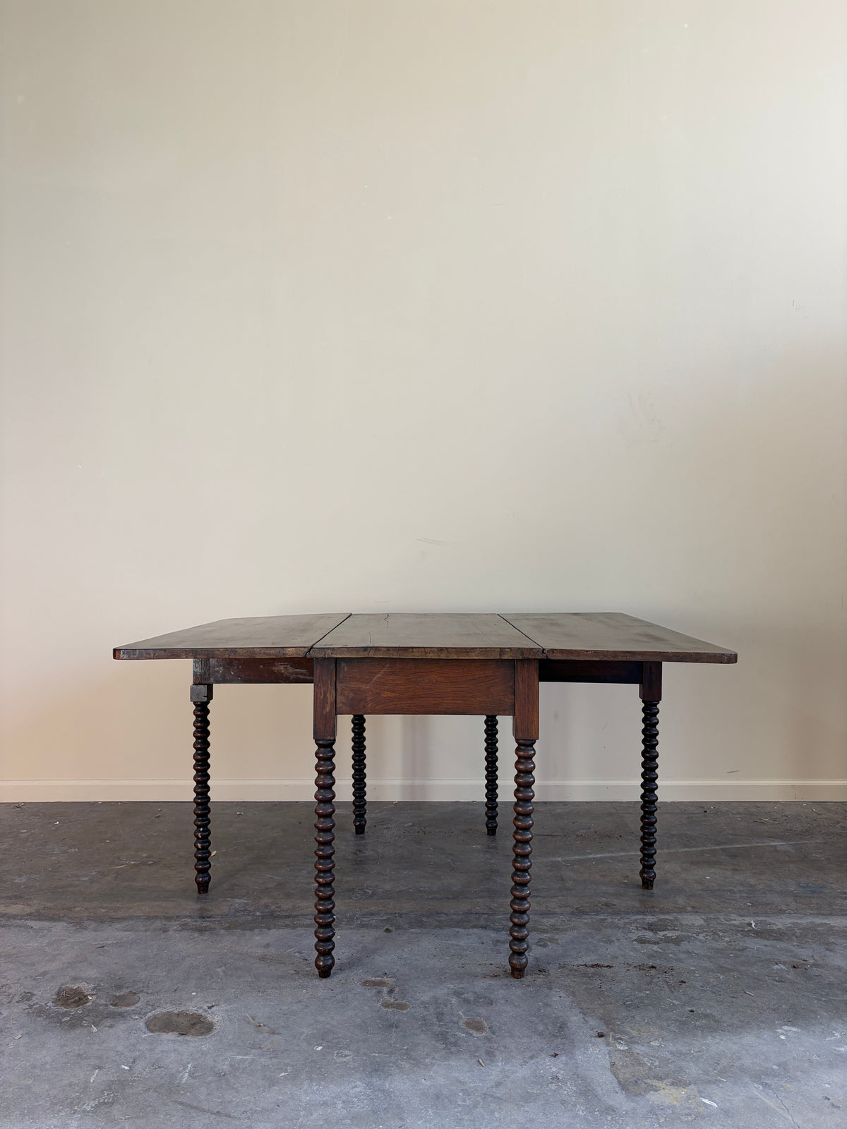 Pennsylvania Sheraton Walnut Six-Leg Drop Leaf Table