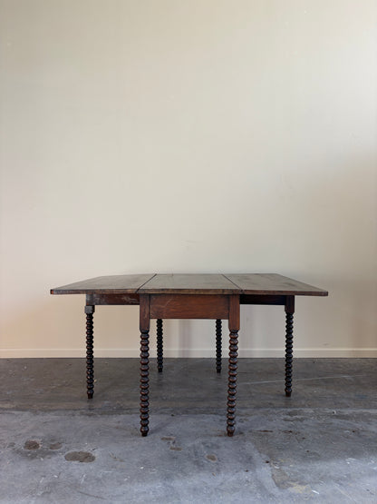 Pennsylvania Sheraton Walnut Six-Leg Drop Leaf Table