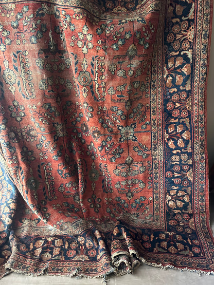 Large rug with some rips