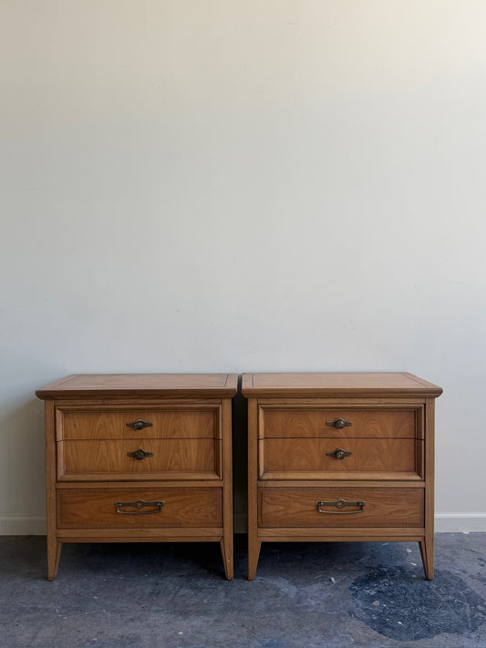 Walnut nightstands. Sold as a pair.