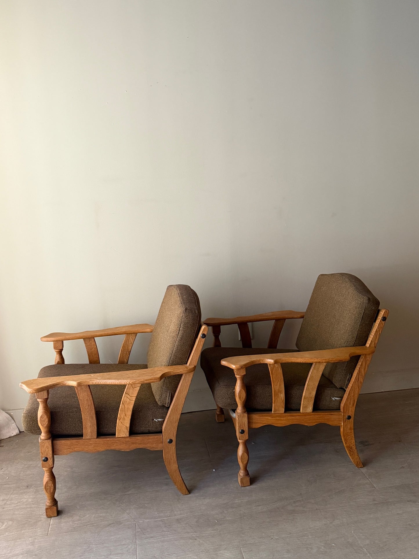 Danish oak lounge chairs. Sold individually.