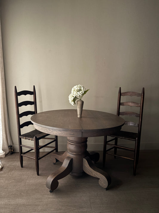 Golden oak dining table with extensions