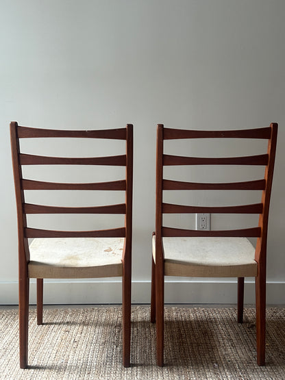 Pair of teak dining chairs