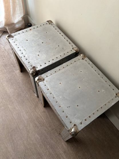 Riveted metal cocktail tables. Sold individually.