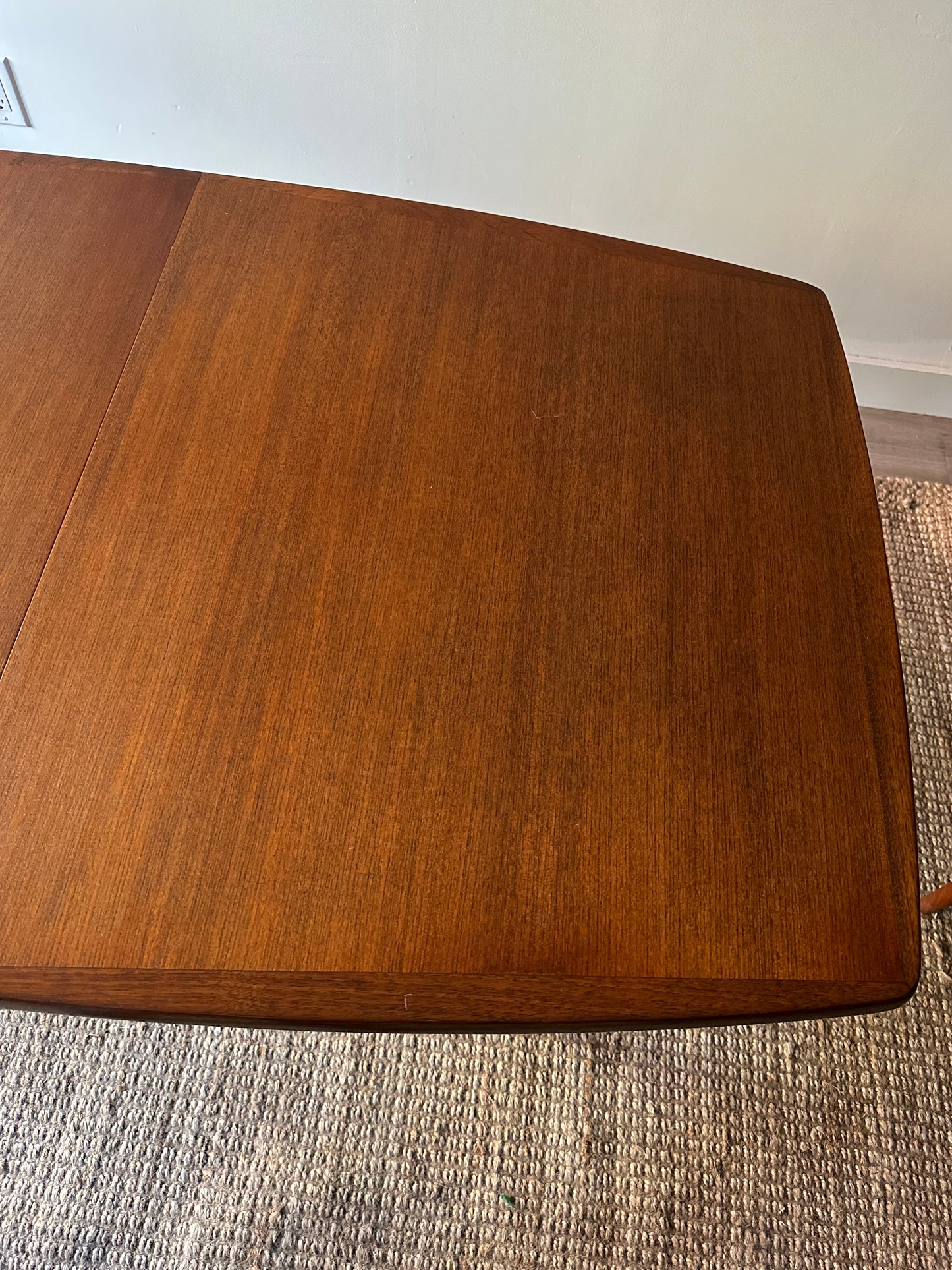 Danish teak dining table with two leaves