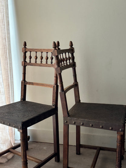 Embossed leather chairs. Sets of 2.
