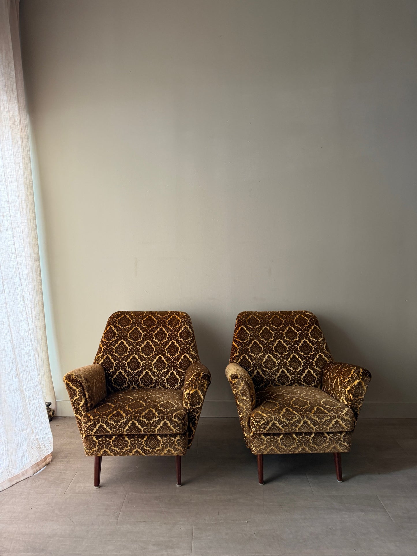 Swedish velvet club chairs. Sold individually.