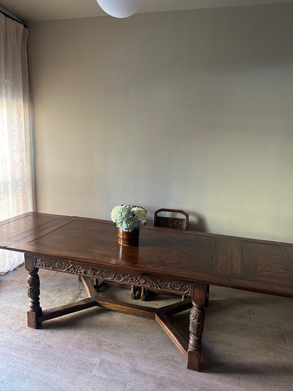 Oak Tudor revival dining table with extensions
