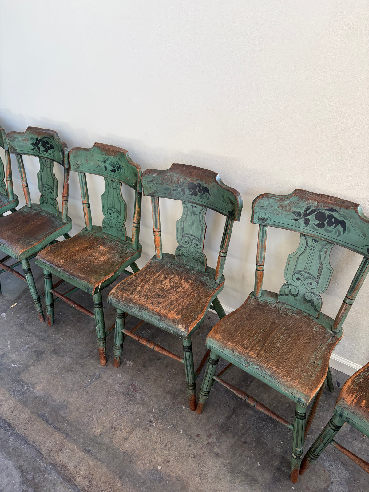 Pennsylvania Sheraton Paint-Decorated Plank Seat Chairs. Sold in pairs.