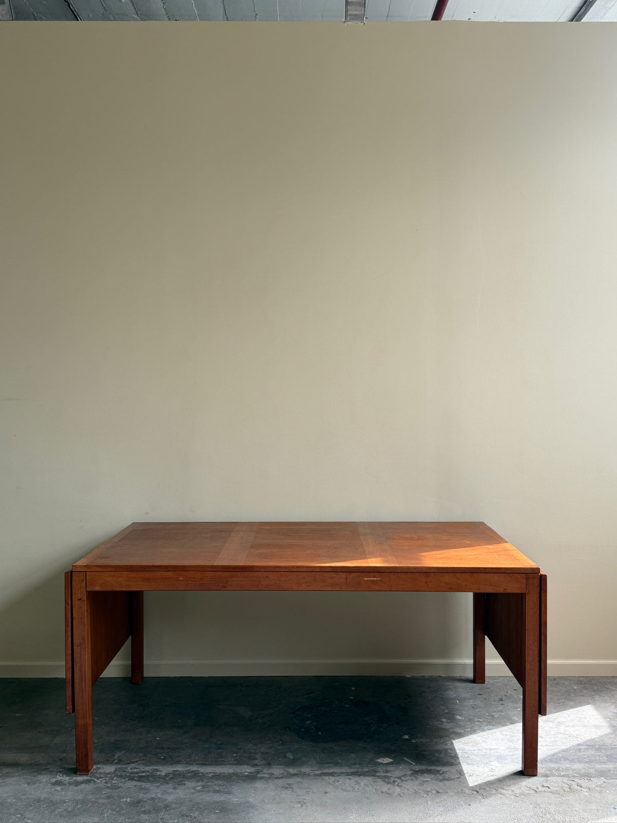 Danish teak dining table with extensions